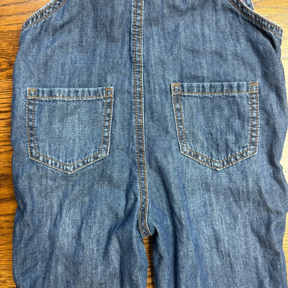 OshKosh B'gosh Girls Ruffled Pocket Soft Blue Denim Overalls Plaid Interior 3T